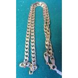 A marked gold 9ct gold curb chain with metal clasp, weight 32g