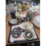 Collection of Guinness items to include; Wedgwood 1984 plate, a clock, a barometer, a money box,