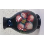 Moorcroft Hibiscus vase decorated with flowers, 11cm high