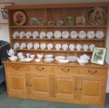 Robert Jameson light oak dresser, the base with four drawers above four cupboard doors 208cm x 222cm