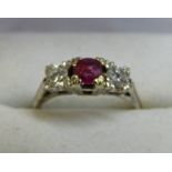 RUBY & DIAMOND 3 - STONE RING, THE 2 BRILLIANT - CUT DIAMONDS OF APPROX 0.