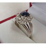 DIAMOND & SAPPHIRE SET RING MARKED 18CT.