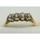 DIAMOND 4-STONE RING THE SETTING MARKED 18CT & PLAT Condition Report: Ring size: L.