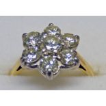 DIAMOND CLUSTER RING IN SETTING MARKED 18CT & SET WITH 7 BRILLIANT-CUT DIAMONDS