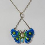 ARTS & CRAFTS ENAMEL BUTTERFLY PENDANT SET WITH MOTHER OF PEARL & RED GEMSTONES ON FINE CHAIN