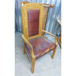 EARLY 20TH CENTURY OAK GENTLEMANS LIBRARY ARMCHAIR ON SQUARE SUPPORTS