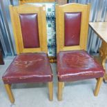 PAIR EARLY 20TH CENTURY OAK & LEATHER LIBRARY ARMCHAIRS ON SQUARE SUPPORTS