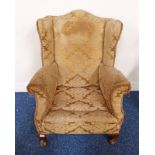 LATE 19TH CENTURY WINGBACK ARMCHAIR ON QUEEN ANNE SUPPORTS