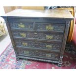 19TH CENTURY OAK CHEST WITH CARVED DECORATION & 2 SHORT OVER 3 LONG DRAWERS ON BUN FEET