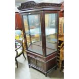 20TH CENTURY ORIENTAL DISPLAY CABINET WITH GLAZED DOOR & CARVED DECORATION