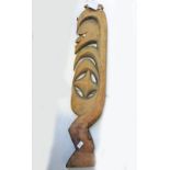 SEPIK RIVER CARVED WOODEN FIGURE WITH SHELL EYES Condition Report: 59cm long. 11.
