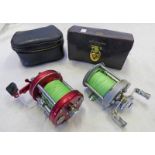 ABU AMBASSADEUR NO 6000 MULTIPLIER IN CASE AND A PFLUEGER SUPREME MULTIPLIER REEL -2-