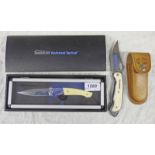 TIMBERLINE WALL STREET TACTICAL KNIFE IN BOX AND A MOSSBERG KNIFE -2-- BUYER MUST BE OVER THE AGE