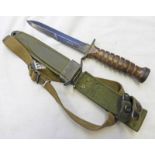 COPY OF A USA M3 FIGHTING KNIFE IN ITS M8AI SCABBARD WITH WEBBING LEG STRAP AS USED BY AIRBORNE