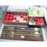 COMPOSITE SNOOKER BALLS IN A WOODEN CASE AND A GAMAGES SNOOKER SCORE BOARD AND A SET OF KTG MINOLTA