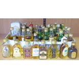 LARGE SELECTION OF WHISKY MINIATURES INCLUDING FAMOUS GROUSE, BELL'S DIMPLE,