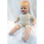 COMPOSITE HEADED DOLL WITH WEIGHTED EYES & PAINTED LIPS MARKED E.I.H. CO INC.