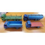 FOUR PLAYWORN DINKY TOY LORRIES INCLUDING FODEN TANKER, GUY FLATBED,