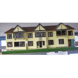 TRIANG WOODEN DOLLS HOUSE Condition Report: has been repainted.