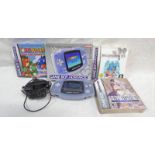 NINTENDO GAMEBOY ADVANCE TOGETHER WITH A SELECTION OF GAMES INCLUDING SUPER MARID ADVANCE 2,