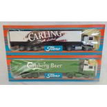 TWO TEKNO 1:50 SCALE MODEL HGVS WITH CARLING AND CARLSBERG LIVERIES.