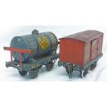 TWO HORNBY 0 GAUGE WAGONS INCLUDING COLAS TANK WAGON TOGETHER WITH CRAWFORDS BISCUITS WAGON