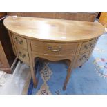 19TH CENTURY MAHOGANY BOW FRONTED SIDE CABINET WITH 4 DRAWERS & 2 PANEL DOORS ON SQUARE TAPERED