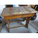 EARLY 20TH CENTURY CARVED OAK DESK WITH LIFT UP TOP & FITTED INTERIOR