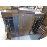 20TH CENTURY MAHOGANY BOOK CASE ON QUEEN ANNE SUPPORTS Condition Report: length 127