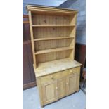 EARLY 20TH CENTURY PINE DRESSER WITH OPEN SHELVES ABOVE 2 SHORT DRAWERS OVER 2 PANEL DOORS