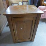 EARLY 20TH CENTURY PINE BEDSIDE CABINET WITH PANEL DOOR