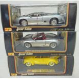 THREE MAISTO 1:18 SCALE SPECIAL EDITION MODELS INCLUDING JAGUAR XJ220 TOGETHER WITH PORSCHE BOXSTER