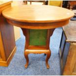 EARLY 20TH CENTURY CIRCULAR TABLE WITH GREEN GLASS PANEL & SHAPED SUPPORTS