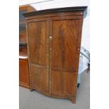 EARLY 20TH CENTURY MAHOGANY TWO DOOR BOW FRONT WARDROBE ON BRACKET SUPPORTS Condition