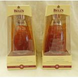 PAIR OF BOXED BELLS 8 YEAR OLD MILLENNIUM DECANTERS 40% VOL,