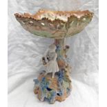 NAUTILUS PORCELAIN FIGURAL TABLE CENTRE WITH OVAL BASKET ON A TREE SHAPED COLUMN WITH A YOUNG GIRL