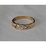 18CT GOLD 7 STONE DIAMOND SET RING Condition Report: Ring size: O. Approx 2.