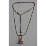 9CT GOLD GEM SET PENDANT ON FINE CHAIN