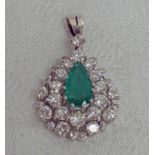 EMERALD AND DIAMOND PENDANT WITH PEAR-SHAPED EMERALD SURROUNDED BY ROUND BRILLIANT-CUT DIAMONDS