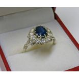 SAPPHIRE AND DIAMOND CLUSTER RING,