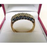 9CT GOLD DIAMOND SET 7-STONE RING, APPROX 0.