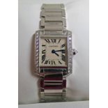 18CT WHITE GOLD DIAMOND SET CARTIER TANK FRANCAISE LADY'S WRISTWATCH WITH ENAMEL DIAL ON 18CT GOLD
