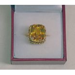 CITRINE SET RING IN SETTING MARKED 18K Condition Report: Ring size: L.