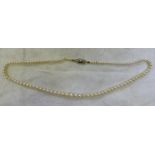 CULTURED PEARL NECKLACE ON CLASP MARKED SILVER