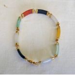 ORIENTAL HARDSTONE BRACELET WITH CHINESE MOUNTS AND MARKED 585