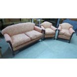 3 PIECE EARLY 20TH CENTURY PINK FLORAL OVERSTUFFED SUITE ON SHAPED SUPPORTS