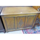 20TH CENTURY OAK COFFER WITH CARVED DECORATION 76 CM TALL