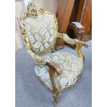 FRENCH ROCOCO STYLE GILT ARMCHAIR WITH HEAVILY CARVED DECORATION - 107 CM TALL