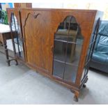 20TH CENTURY WALNUT BOOKCASE WITH PANEL DOOR FLANKED BY 2 GLAZED DOORS ON SHAPED SUPPORTS