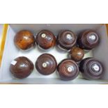 SET OF 8 SMALL LIGNUM VITAE INDOOR BOWLS & JACK Condition Report: Bowls are 8 1/2